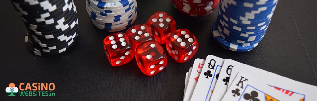 White casino chip with red dice and cards